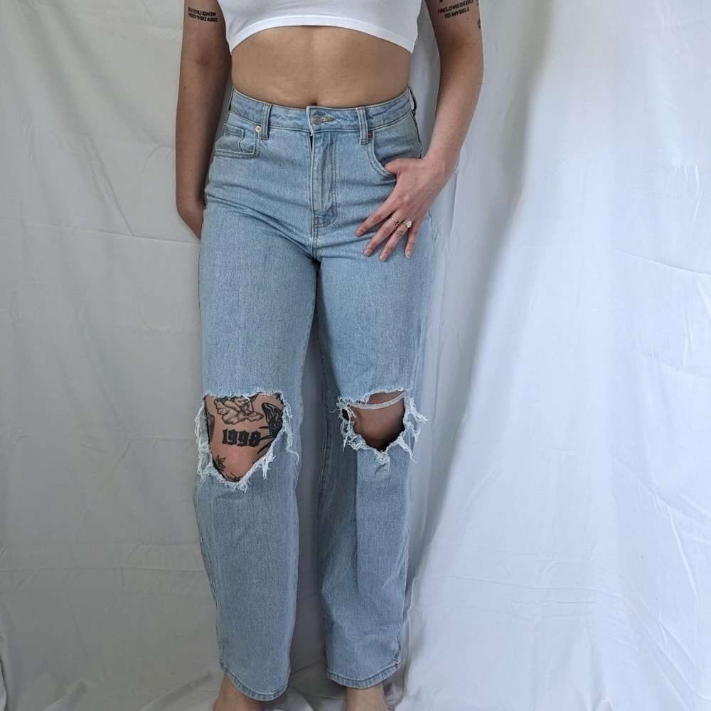High waisted distressed wide legged jeans